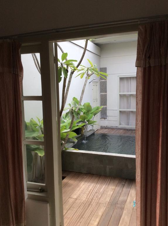 Апартаменты The Patio Yogya Джокьякарта Экстерьер фото